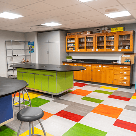 Colorful tile floor and cabinets in classroom Colorful tile floor and cabinets in classroom