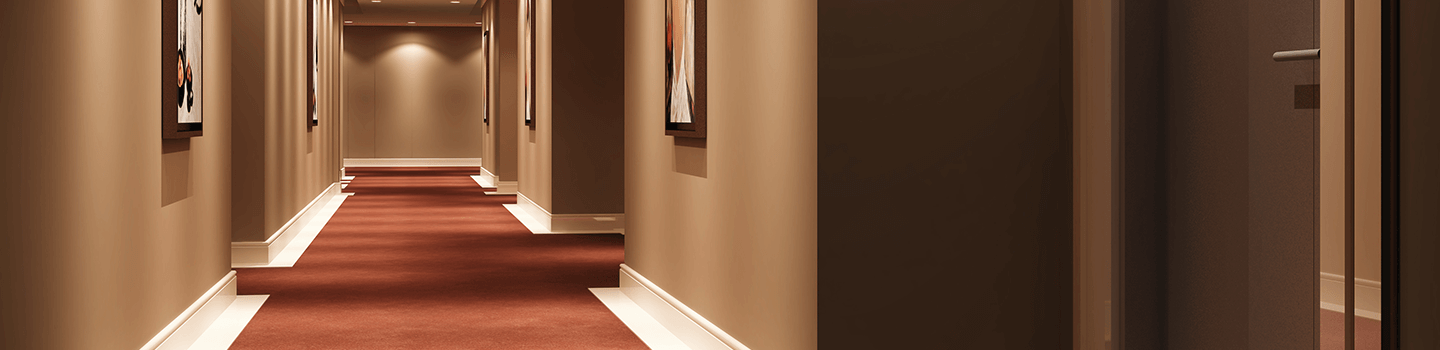 Hallway of retirement home with red carpet