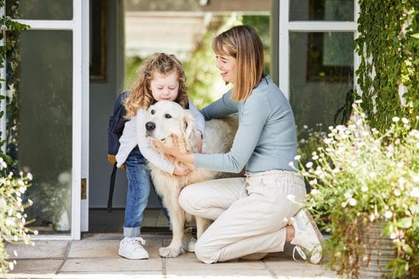 girl-and-mom-with-dog_resized little girl with mom and golden retriever