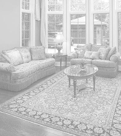Oriental-Rug-Cleaning-Living-Room-with-Clean-Rug Oriental area rug laying in the middle of a clean living room.