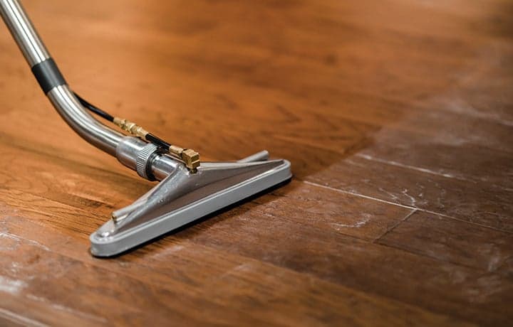 Cleaning hardwood floors and removing dust Cleaning hardwood floors and removing dust