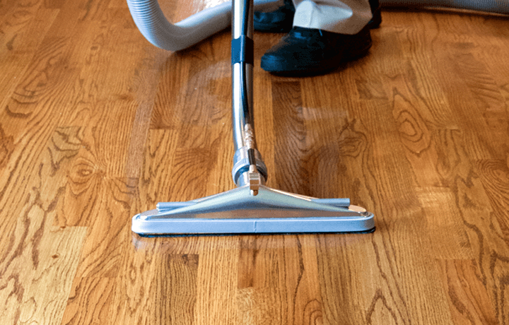Professionally Cleaning Hardwood Floors Hardwood floor cleaning machine being used by technician
