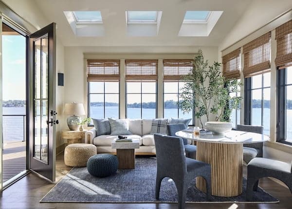 area rug in living room with lots of natural light