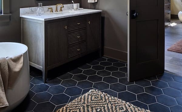 black and white shaped tile in bathroom