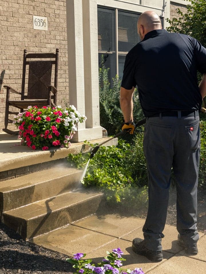 A counter rotating brush machine being used to clean a retail store carpet