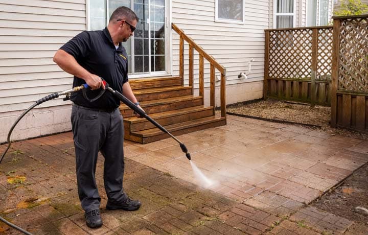 A counter rotating brush machine being used to clean a retail store carpet