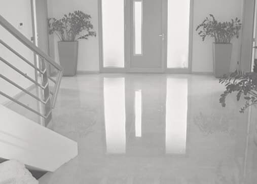 Clean natural stone floors in an entryway. 