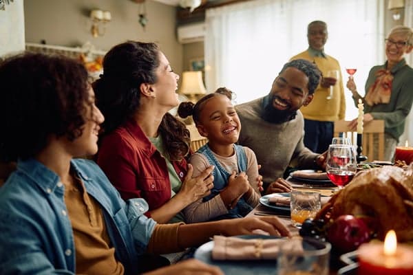 family enjoying holiday meal