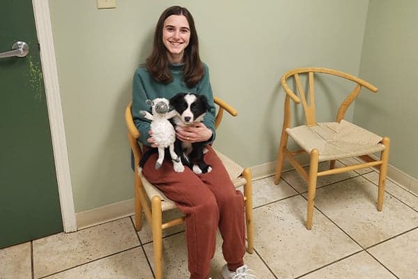 Blog Author and Her Puppy blog author and border collie puppy at 8 weeks old
