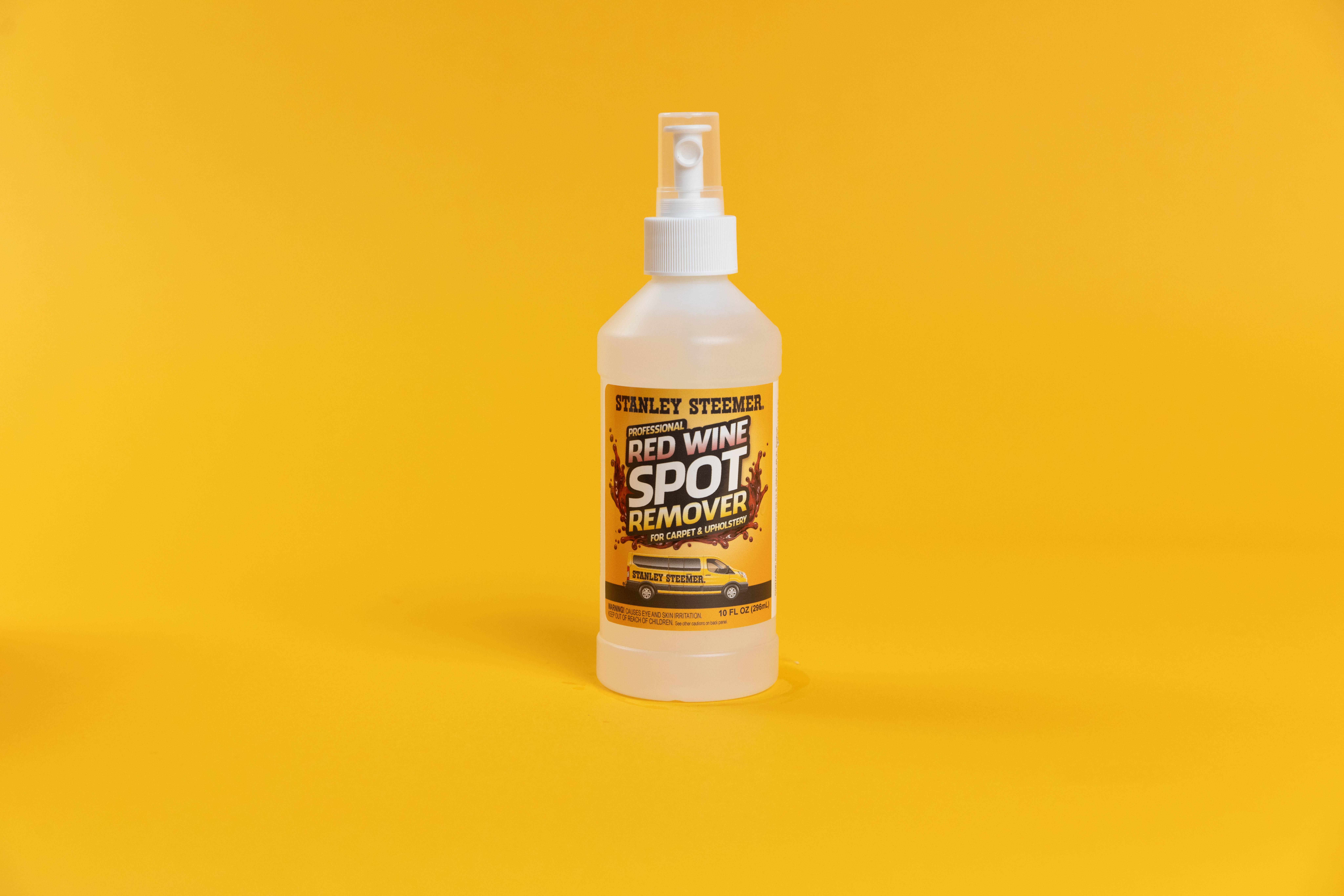 Stanley Steemer Red Wine Spot Remover stanley steemer red wine spot remover bottle against orange background