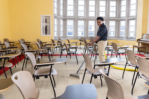 tech cleaning classroom carpet